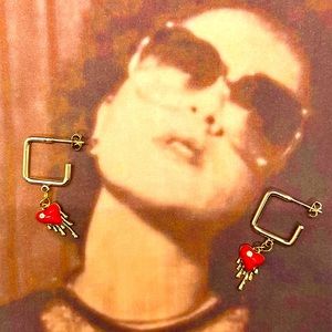 NWT| Gold Hoop earrings with heart charm’s